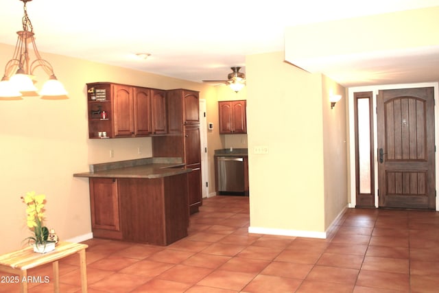 9939 W Ironwood Dr, Sun City, AZ 85351 - kitchen featuring a peninsula, dishwasher, light tile patterned floors, decorative light fixtures, and a ceiling fan