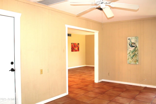 9939 W Ironwood Dr, Sun City, AZ 85351 - empty room with tile patterned floors and a ceiling fan