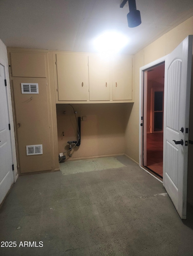9939 W Ironwood Dr, Sun City, AZ 85351 - laundry area with baseboards