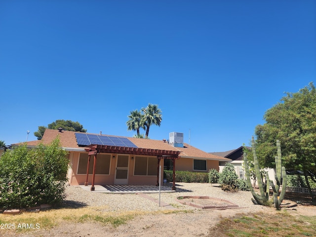 9939 W Ironwood Dr, Sun City, AZ 85351 - back of property featuring a patio and roof mounted solar panels