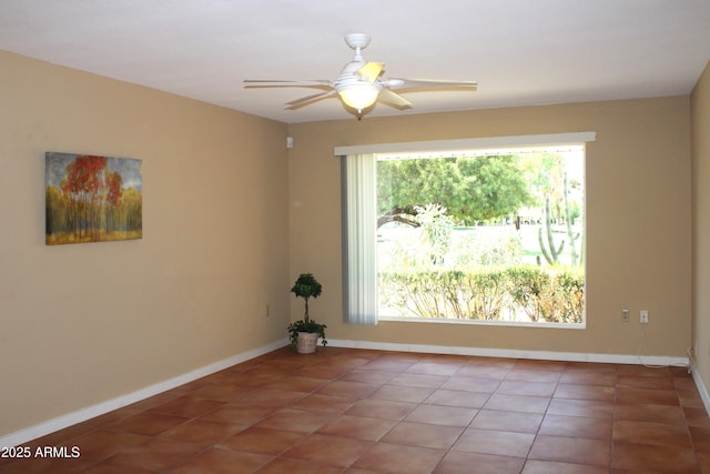 9939 W Ironwood Dr, Sun City, AZ 85351 - unfurnished room with light tile patterned floors and a ceiling fan