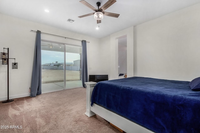 carpeted bedroom featuring access to exterior and ceiling fan