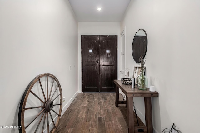 doorway to outside featuring dark hardwood / wood-style flooring