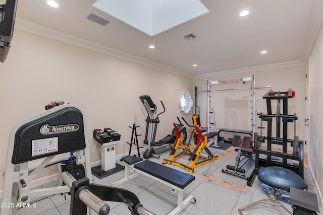 exercise area featuring crown molding