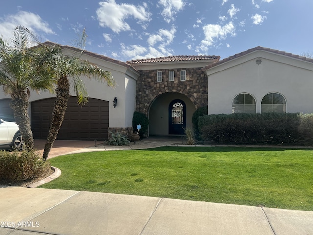 mediterranean / spanish-style home with stucco siding, concrete driveway, an attached garage, stone siding, and a front lawn