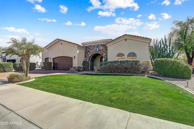 mediterranean / spanish-style home with a garage, stone siding, concrete driveway, and stucco siding