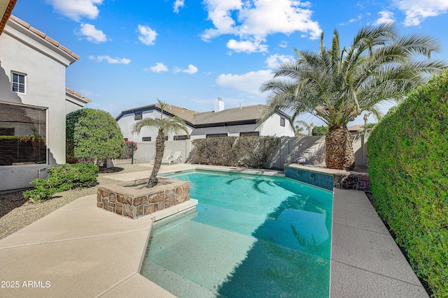 view of swimming pool with a fenced backyard, a fenced in pool, and a patio