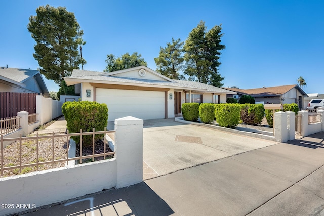 15608 N 57th Dr, Glendale, AZ 85306 - single story home with concrete driveway, a garage, a fenced front yard, and stucco siding