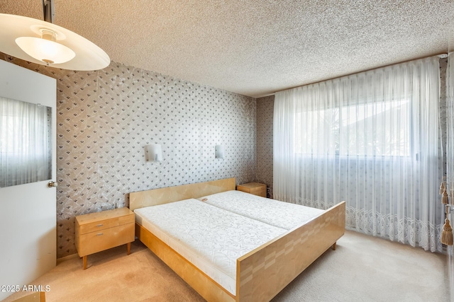 15608 N 57th Dr, Glendale, AZ 85306 - carpeted bedroom featuring wallpapered walls and a textured ceiling