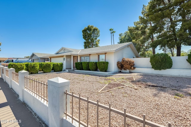15608 N 57th Dr, Glendale, AZ 85306 - ranch-style house featuring a fenced front yard, a garage, and stucco siding