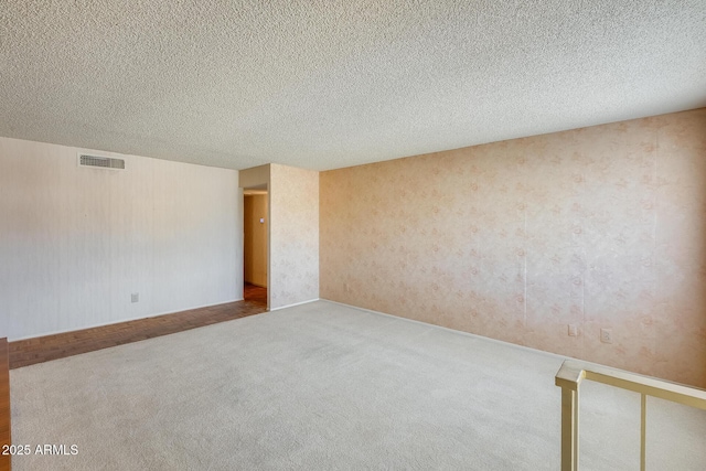 15608 N 57th Dr, Glendale, AZ 85306 - unfurnished room featuring carpet floors and a textured ceiling
