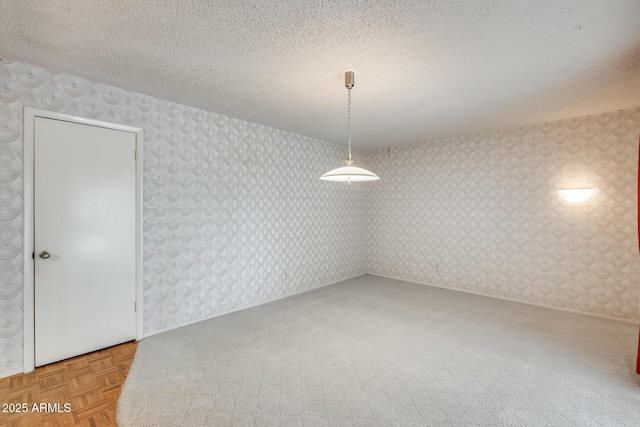 15608 N 57th Dr, Glendale, AZ 85306 - unfurnished dining area featuring wallpapered walls and a textured ceiling