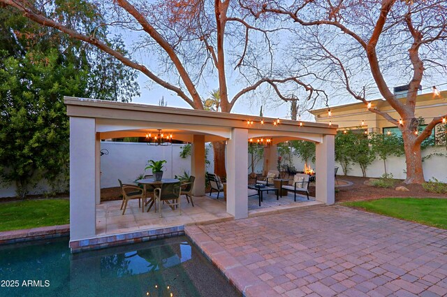 18 W Kaler Dr, Phoenix, AZ 85021 - fenced backyard featuring a patio, a gazebo, an outdoor hangout area, and an outdoor pool
