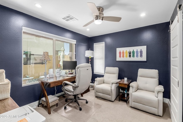 office area with a ceiling fan, a textured wall, and recessed lighting