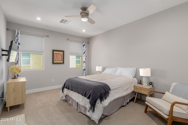 bedroom featuring recessed lighting, light carpet, baseboards, and ceiling fan