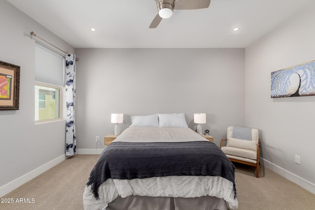 bedroom with light colored carpet, baseboards, recessed lighting, and ceiling fan