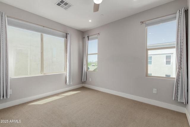 unfurnished room with carpet flooring, ceiling fan, baseboards, and recessed lighting