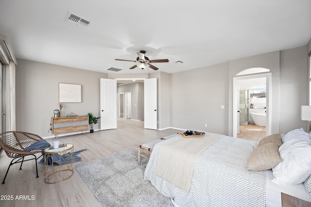 bedroom featuring light hardwood / wood-style flooring and ceiling fan