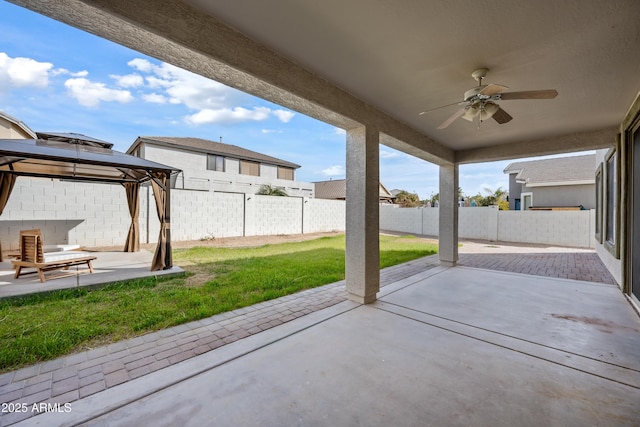 view of patio featuring a gazebo and ceiling fan