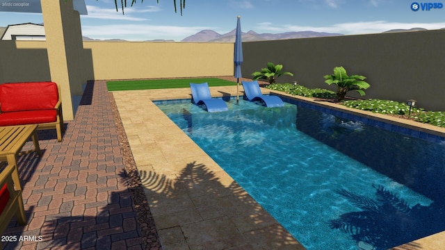 view of pool featuring a mountain view and a patio area