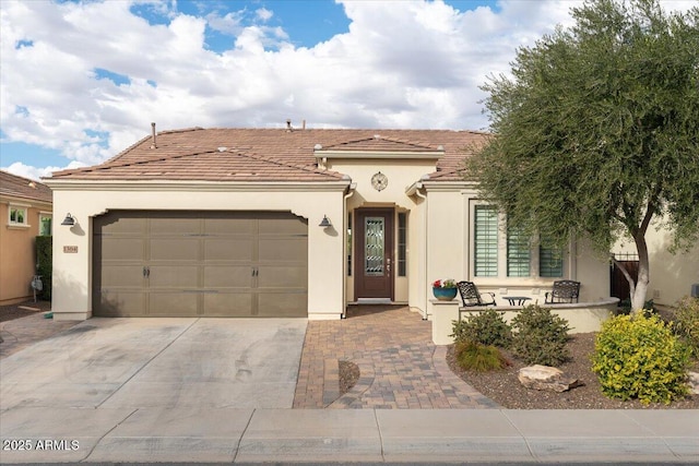 mediterranean / spanish-style house featuring a garage