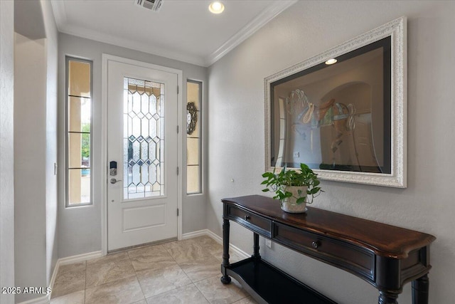 entrance foyer featuring ornamental molding