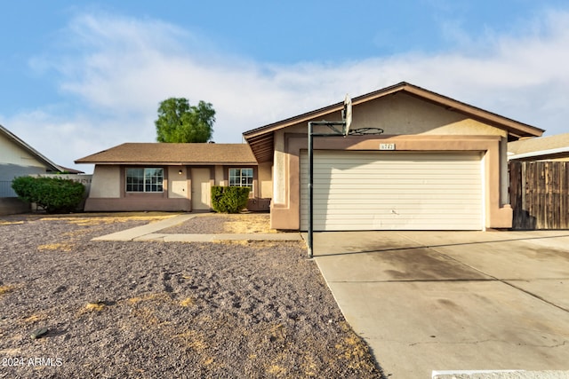 single story home with a garage