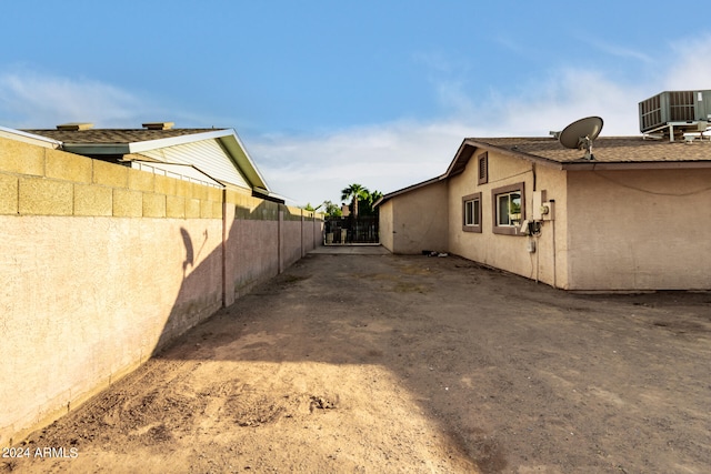 view of property exterior with central air condition unit