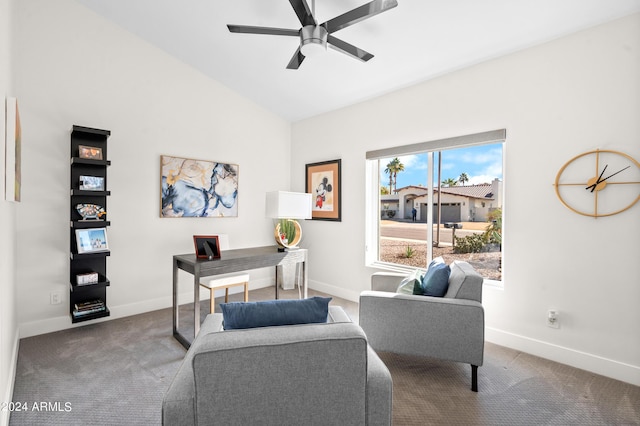 carpeted office space with baseboards, a ceiling fan, and lofted ceiling
