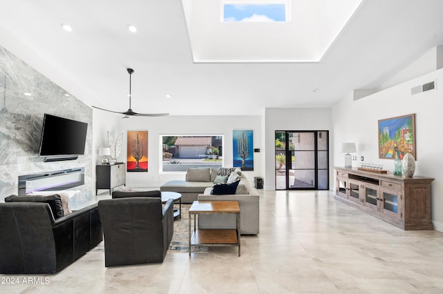 living area with ceiling fan, visible vents, and recessed lighting