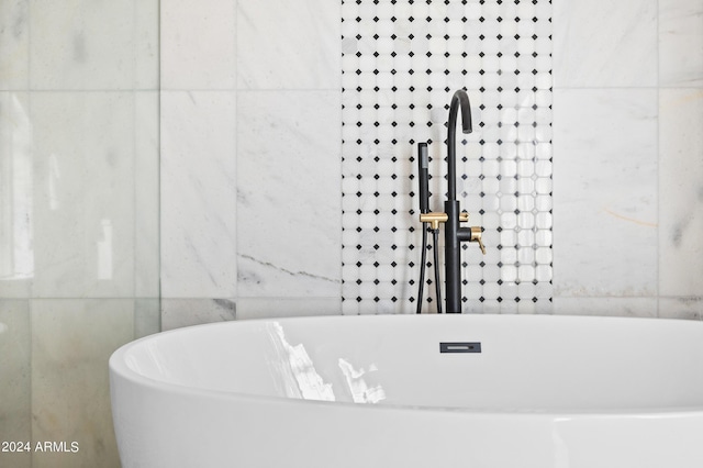 full bath with a freestanding tub
