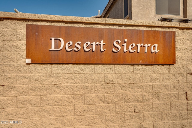 view of community sign