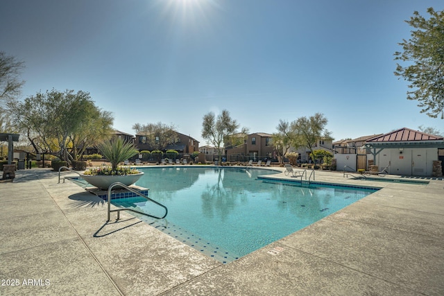 view of swimming pool featuring a gazebo