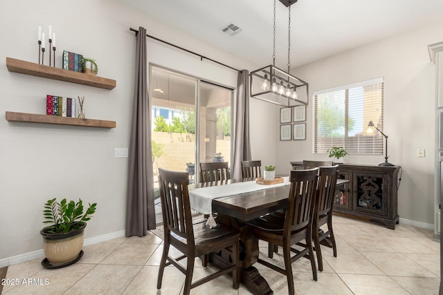 2030 W Whisper Rock Trl, Phoenix, AZ 85085 - dining room with light tile patterned floors and healthy amount of natural light