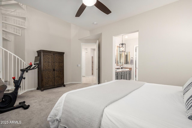 2030 W Whisper Rock Trl, Phoenix, AZ 85085 - bedroom with light colored carpet, ensuite bathroom, and ceiling fan