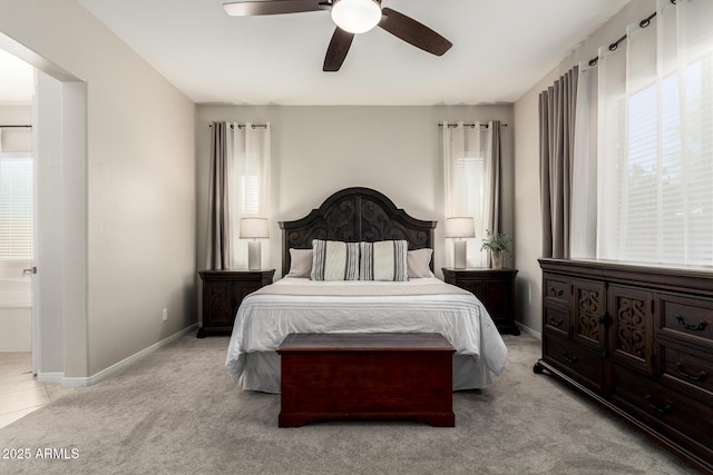 2030 W Whisper Rock Trl, Phoenix, AZ 85085 - bedroom with multiple windows, light carpet, and ceiling fan
