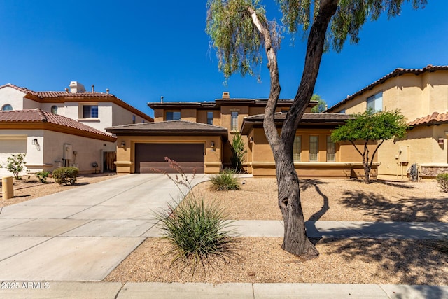 2030 W Whisper Rock Trl, Phoenix, AZ 85085 - view of front of house featuring driveway, a garage, and stucco siding