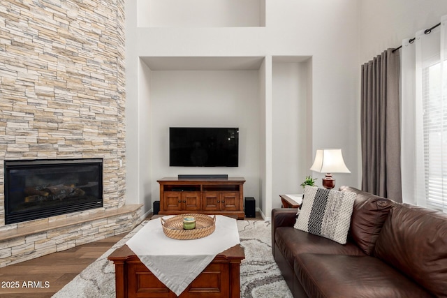 2030 W Whisper Rock Trl, Phoenix, AZ 85085 - living room with wood finished floors and a fireplace
