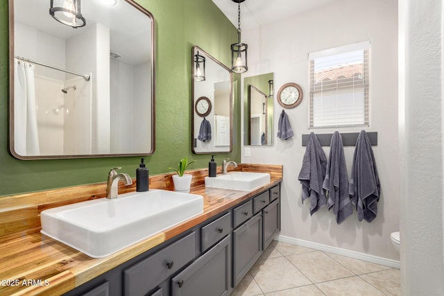 2030 W Whisper Rock Trl, Phoenix, AZ 85085 - bathroom featuring double vanity, tile patterned floors, and a shower with shower curtain