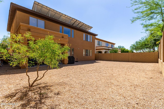 2030 W Whisper Rock Trl, Phoenix, AZ 85085 - back of house with stucco siding