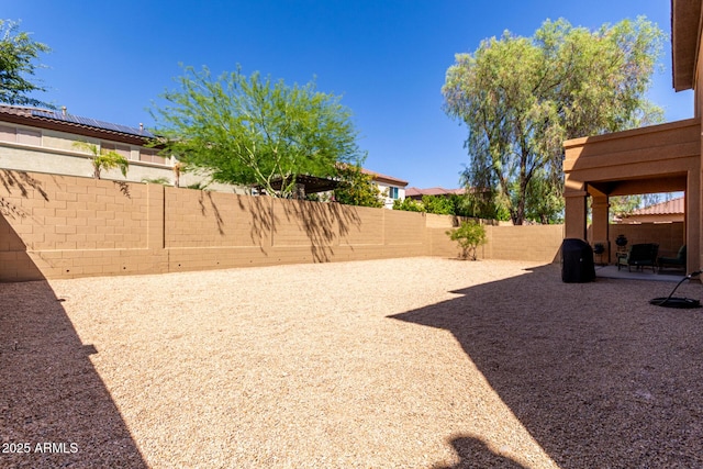 2030 W Whisper Rock Trl, Phoenix, AZ 85085 - fenced backyard with a patio area