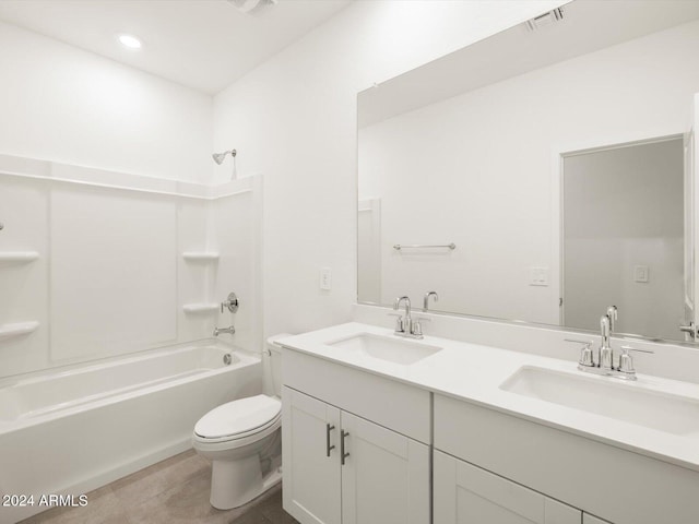 full bath with a sink, visible vents, toilet, and shower / tub combination