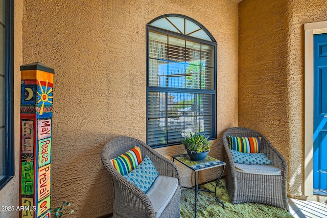 exterior space with a textured wall