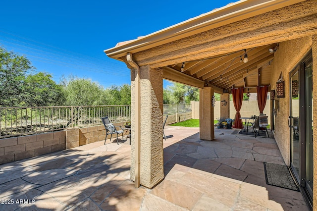 view of patio featuring a fenced backyard