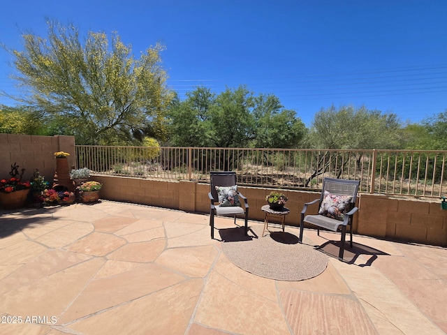 view of patio / terrace with fence