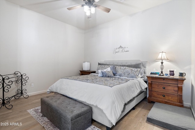 bedroom featuring ceiling fan and light hardwood / wood-style floors