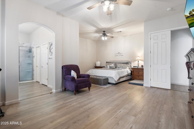 bedroom with ceiling fan and light hardwood / wood-style flooring