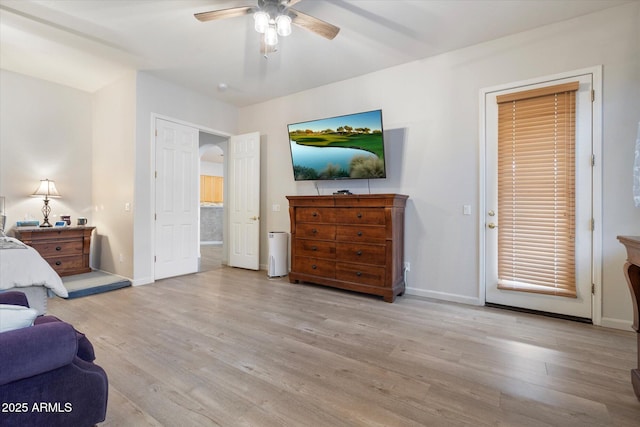 bedroom featuring ceiling fan and light hardwood / wood-style flooring