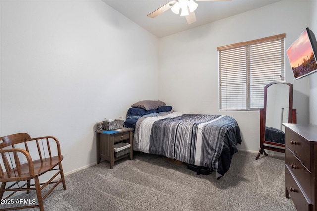 bedroom with ceiling fan and carpet