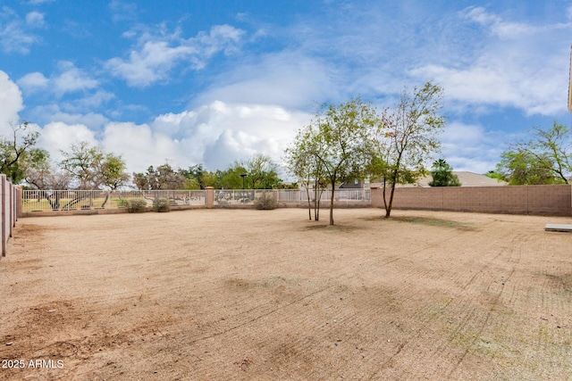 view of yard featuring fence